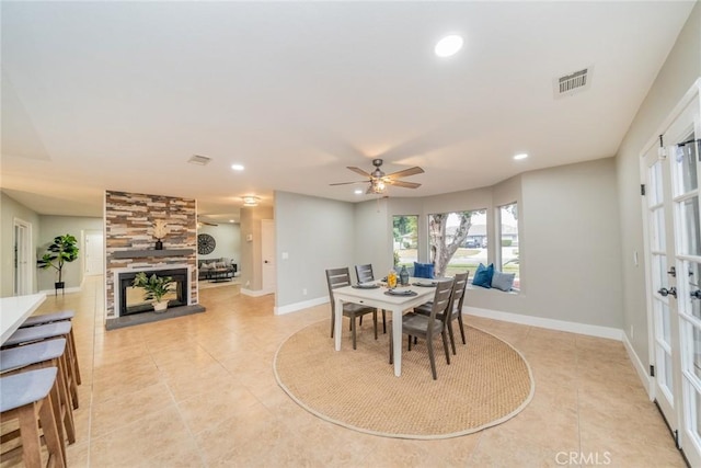 6367 Willow Ave, Rialto, CA 92377 - dining room with light tile patterned floors, recessed lighting, a ceiling fan, and a tile fireplace
