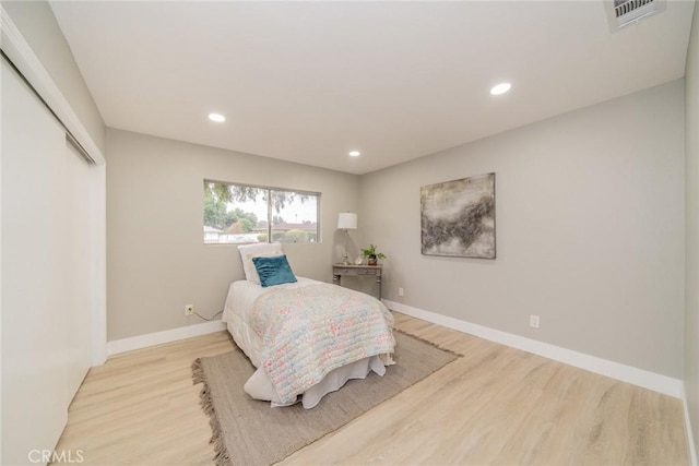 6367 Willow Ave, Rialto, CA 92377 - bedroom featuring wood finished floors, recessed lighting, and a closet