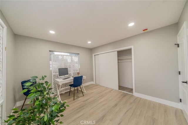 6367 Willow Ave, Rialto, CA 92377 - home office with light wood-style floors and recessed lighting