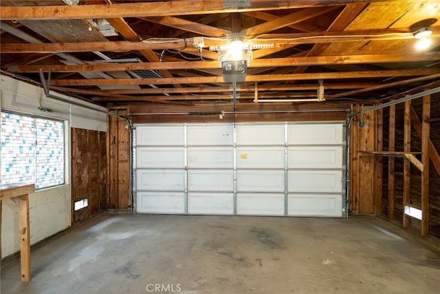 6367 Willow Ave, Rialto, CA 92377 - garage featuring a garage door opener