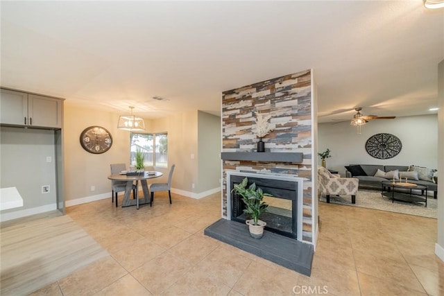 6367 Willow Ave, Rialto, CA 92377 - living room with light tile patterned flooring and ceiling fan