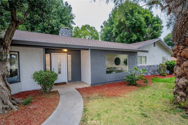 6367 Willow Ave, Rialto, CA 92377 - single story home featuring stucco siding, a front yard, a chimney, and a shingled roof