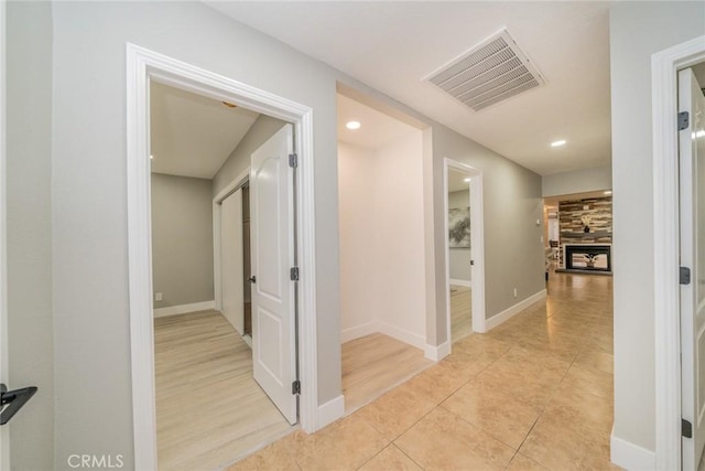 6367 Willow Ave, Rialto, CA 92377 - hallway featuring recessed lighting and light tile patterned floors