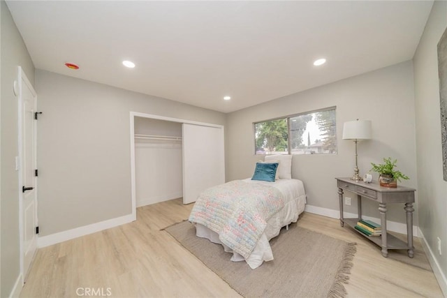 6367 Willow Ave, Rialto, CA 92377 - bedroom featuring light wood-style floors, a closet, and recessed lighting