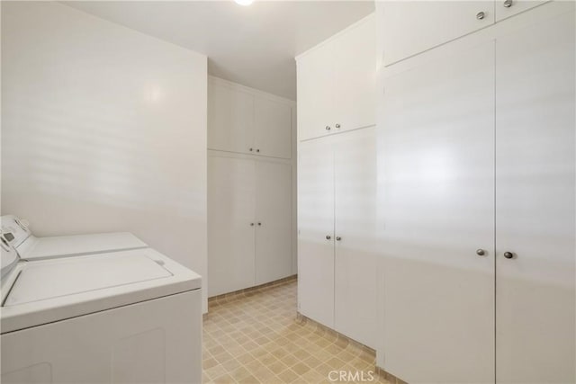 920 Wildrose, Brea, CA 92821 - washroom featuring separate washer and dryer, cabinet space, and light flooring