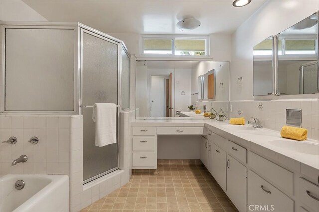 920 Wildrose, Brea, CA 92821 - bathroom with double vanity, a shower stall, a bath, and backsplash