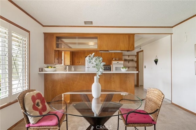 920 Wildrose, Brea, CA 92821 - dining space with crown molding, plenty of natural light, and a textured ceiling