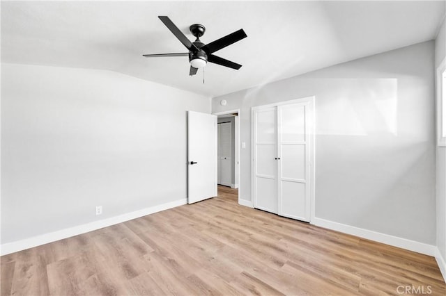 12119 Los Coyotes Ave, La Mirada, CA 90638 - unfurnished bedroom with vaulted ceiling, wood finished floors, baseboards, and ceiling fan