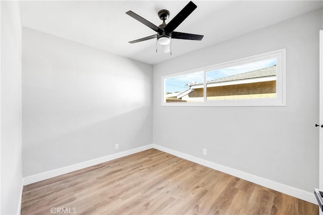 12119 Los Coyotes Ave, La Mirada, CA 90638 - spare room with baseboards, wood finished floors, and ceiling fan