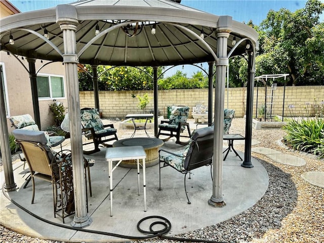 7562 Dartmouth Ave, Rancho Cucamonga, CA 91730 - fenced backyard with a gazebo, a patio, and an outdoor hangout area