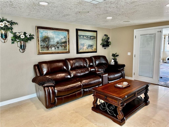 7562 Dartmouth Ave, Rancho Cucamonga, CA 91730 - living room with a textured ceiling, baseboards, and recessed lighting