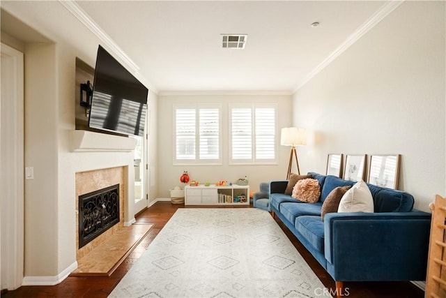 367 Caminito Barcelona, Chula Vista, CA 91914 - living area with crown molding, a high end fireplace, dark wood-style floors, and baseboards