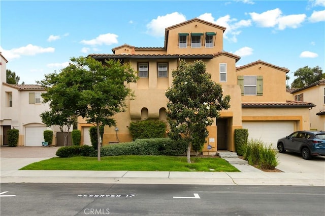 367 Caminito Barcelona, Chula Vista, CA 91914 - view of front of property featuring a garage, concrete driveway, a tile roof, and stucco siding
