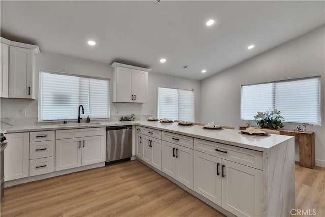 16409 Barbee St, Fontana, CA 92336 - kitchen featuring dishwasher, a peninsula, white cabinets, light wood finished floors, and recessed lighting