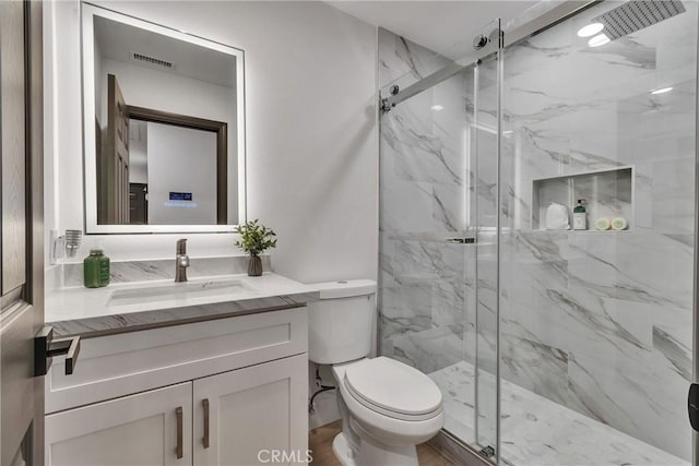 16409 Barbee St, Fontana, CA 92336 - bathroom featuring vanity and a marble finish shower