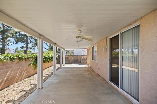 797 Camino De Plata, San Jacinto, CA 92583 - fenced backyard featuring a patio and a ceiling fan