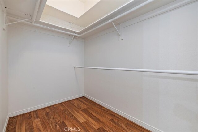 797 Camino De Plata, San Jacinto, CA 92583 - spacious closet featuring wood finished floors