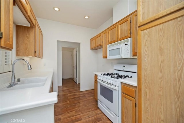 797 Camino De Plata, San Jacinto, CA 92583 - kitchen with white appliances, wood finished floors, light countertops, and recessed lighting