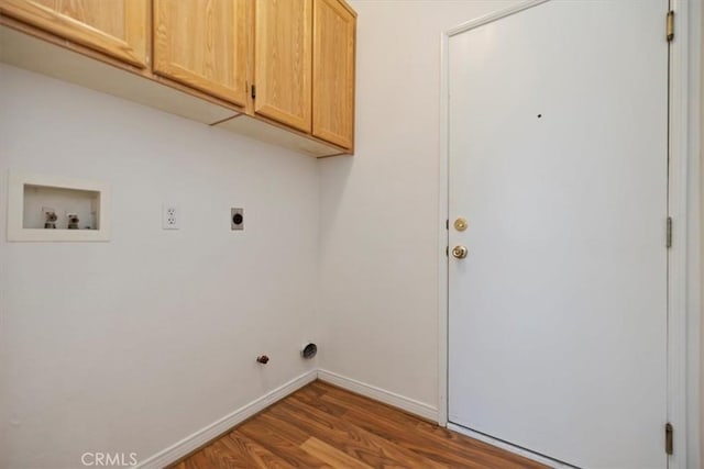 797 Camino De Plata, San Jacinto, CA 92583 - laundry room featuring washer hookup, electric dryer hookup, cabinet space, wood finished floors, and gas dryer hookup