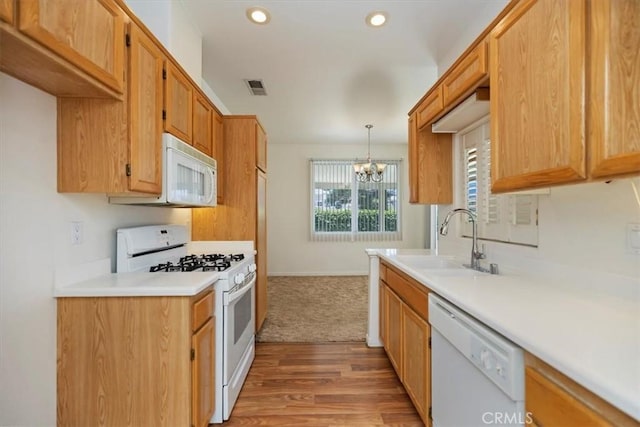 797 Camino De Plata, San Jacinto, CA 92583 - kitchen featuring white appliances, a chandelier, light countertops, light wood-type flooring, and recessed lighting