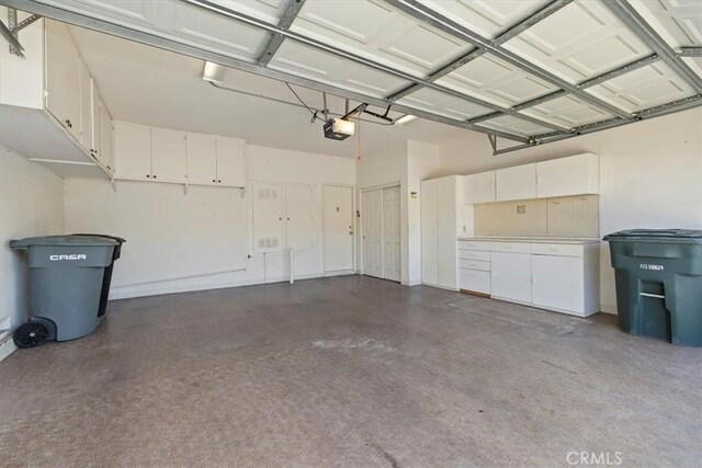 797 Camino De Plata, San Jacinto, CA 92583 - garage featuring a garage door opener