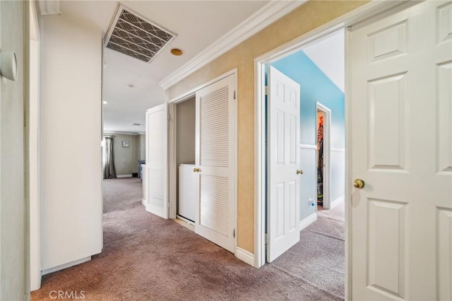 1109 Leopard Ln, Perris, CA 92571 - hallway with carpet flooring, crown molding, and baseboards