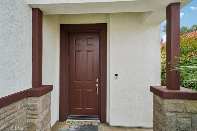 1109 Leopard Ln, Perris, CA 92571 - doorway to property with stucco siding