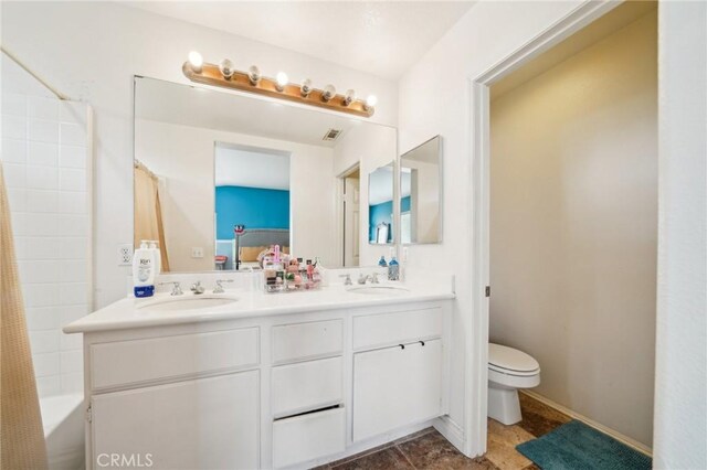 1109 Leopard Ln, Perris, CA 92571 - full bathroom with double vanity, toilet, and shower / bathtub combination with curtain