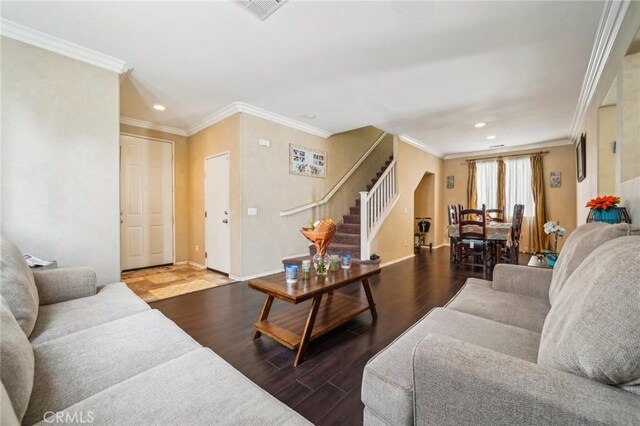 1109 Leopard Ln, Perris, CA 92571 - living area featuring stairway, wood finished floors, recessed lighting, ornamental molding, and baseboards