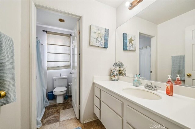 1109 Leopard Ln, Perris, CA 92571 - bathroom with vanity and toilet