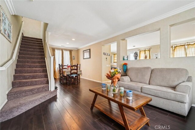 1109 Leopard Ln, Perris, CA 92571 - living room featuring stairs, dark wood-type flooring, ornamental molding, baseboards, and recessed lighting