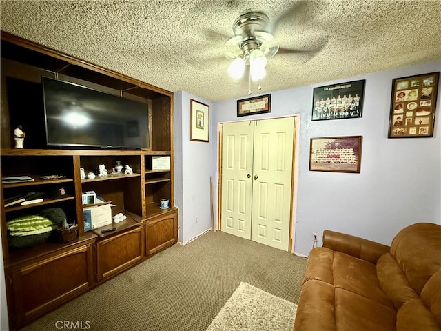 24859 Rock Springs Trl, Moreno Valley, CA 92557 - carpeted living area featuring ceiling fan and a textured ceiling