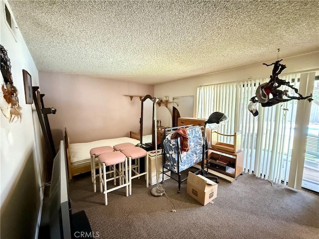 24859 Rock Springs Trl, Moreno Valley, CA 92557 - carpeted bedroom featuring a textured ceiling
