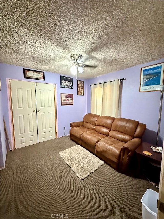 24859 Rock Springs Trl, Moreno Valley, CA 92557 - living area featuring a ceiling fan, carpet, and a textured ceiling