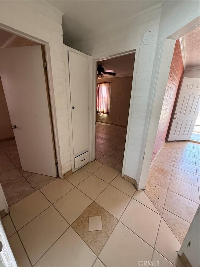 6733 Tamarisk Ave Unit 29, Palms, CA 92277 - hallway with light tile patterned floors