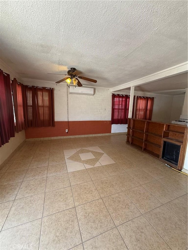 6733 Tamarisk Ave Unit 29, Palms, CA 92277 - unfurnished living room with a wall mounted AC, ceiling fan, and a textured ceiling