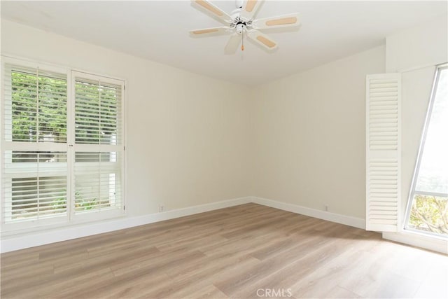 24912 Delos Ave, Mission Viejo, CA 92691 - spare room featuring light wood finished floors, healthy amount of natural light, baseboards, and a ceiling fan