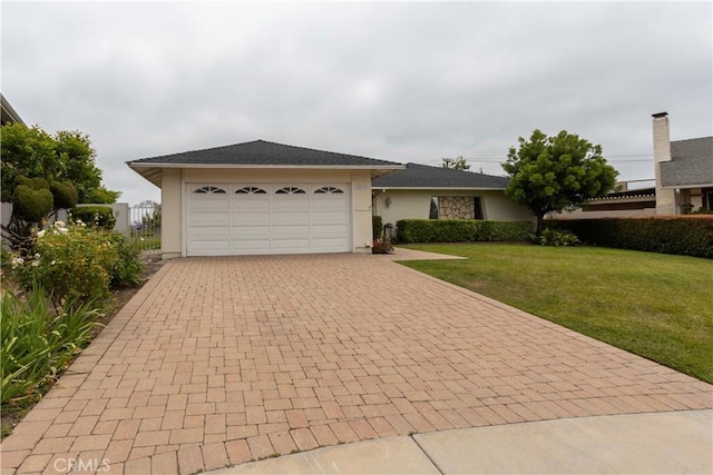 24912 Delos Ave, Mission Viejo, CA 92691 - ranch-style home featuring stucco siding, decorative driveway, a front lawn, and a garage
