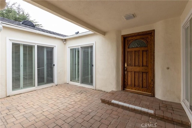 24912 Delos Ave, Mission Viejo, CA 92691 - property entrance featuring stucco siding and a patio