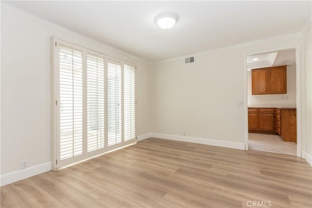 24912 Delos Ave, Mission Viejo, CA 92691 - empty room featuring ornamental molding, light wood-type flooring, and baseboards