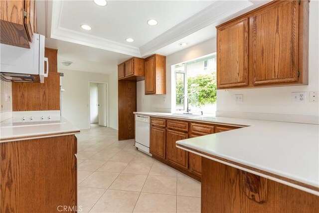 24912 Delos Ave, Mission Viejo, CA 92691 - kitchen with a sink, white dishwasher, brown cabinets, light countertops, and ornamental molding
