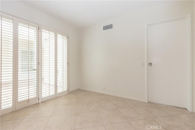 24912 Delos Ave, Mission Viejo, CA 92691 - empty room with light tile patterned floors