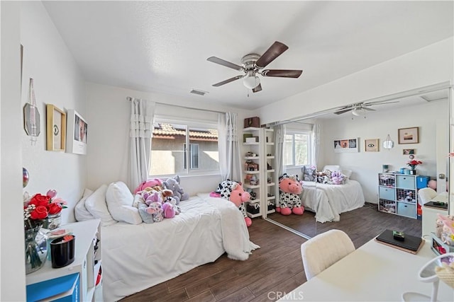 938 Amherst St, Corona, CA 92878 - bedroom with wood finished floors and ceiling fan