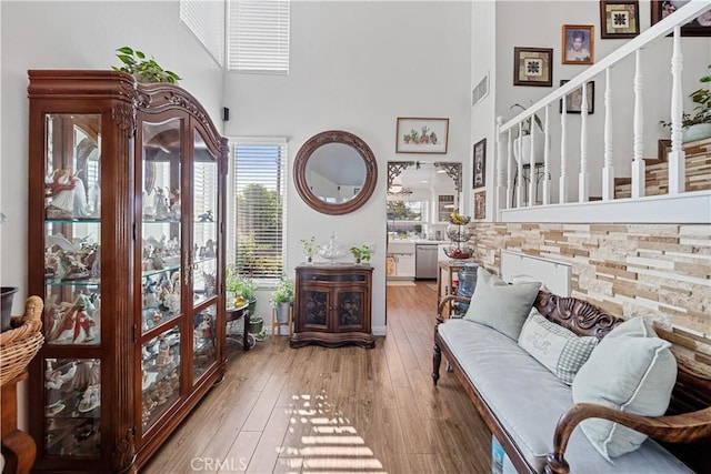 938 Amherst St, Corona, CA 92878 - entrance foyer with a high ceiling, hardwood / wood-style flooring, and stairs