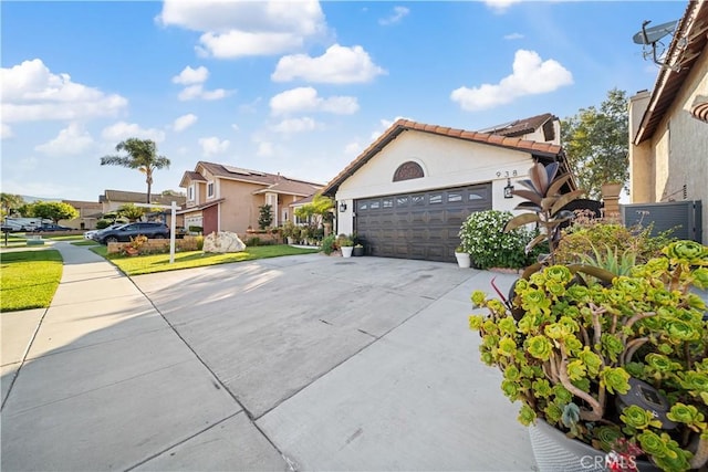 938 Amherst St, Corona, CA 92880 - mediterranean / spanish house with driveway, an attached garage, and stucco siding