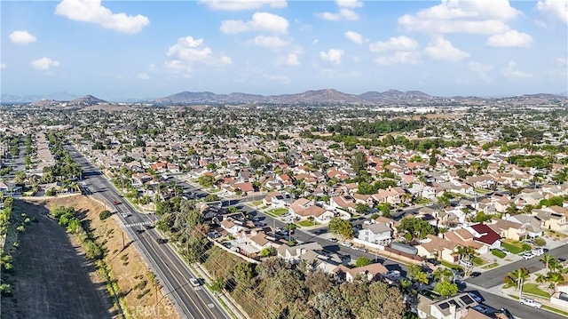 938 Amherst St, Corona, CA 92880 - aerial view of property and surrounding area with a mountainous background and nearby suburban area