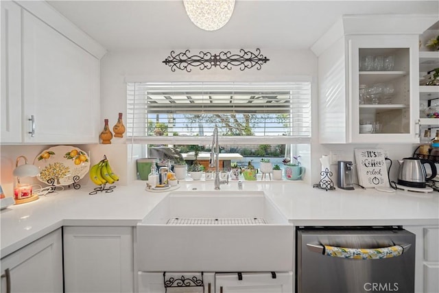 938 Amherst St, Corona, CA 92878 - kitchen featuring dishwasher, white cabinets, glass insert cabinets, and light countertops