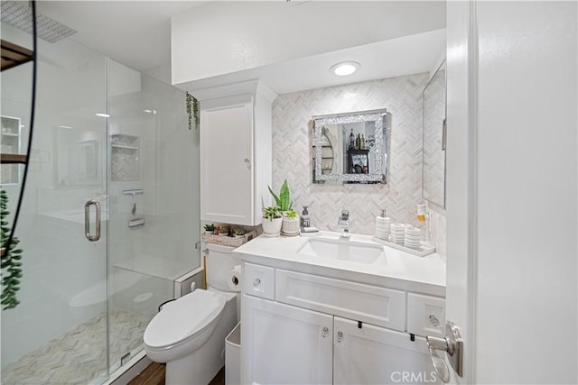 938 Amherst St, Corona, CA 92878 - bathroom featuring vanity, a stall shower, and decorative backsplash
