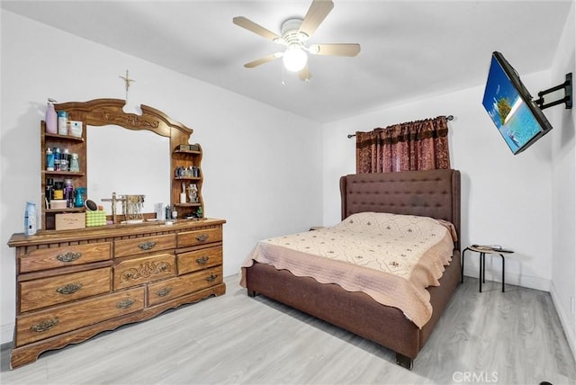 155 N Acacia Ave, Rialto, CA 92376 - bedroom featuring light wood-style flooring, a ceiling fan, and baseboards