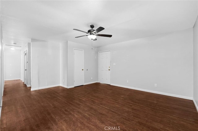 1204 W 5th St, Chico, CA 95928 - unfurnished room with dark wood-style flooring, ceiling fan, and baseboards